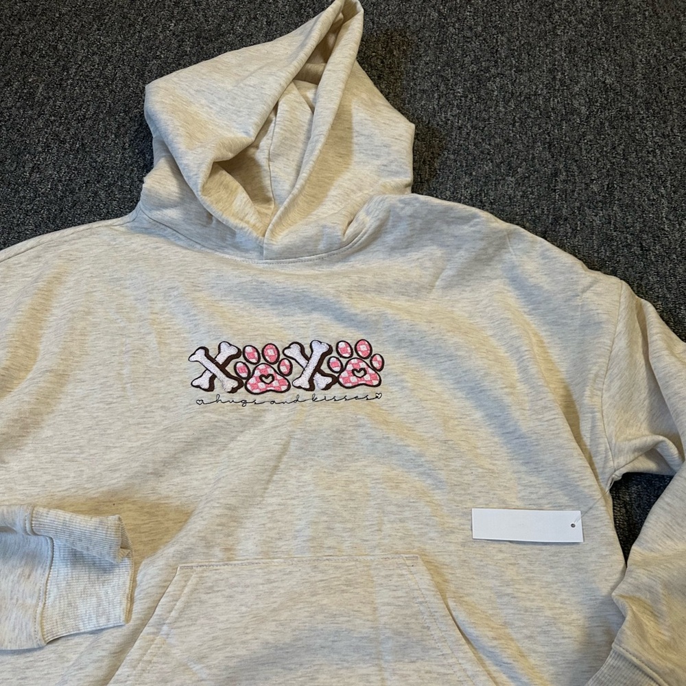 Show your furry friend some love with Hugs and Kisses Dog Bones/Dog Paws hoodie